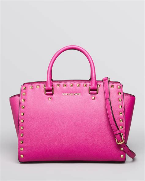 michael kors hot pink satchel|Michael Kors pink studded purse.